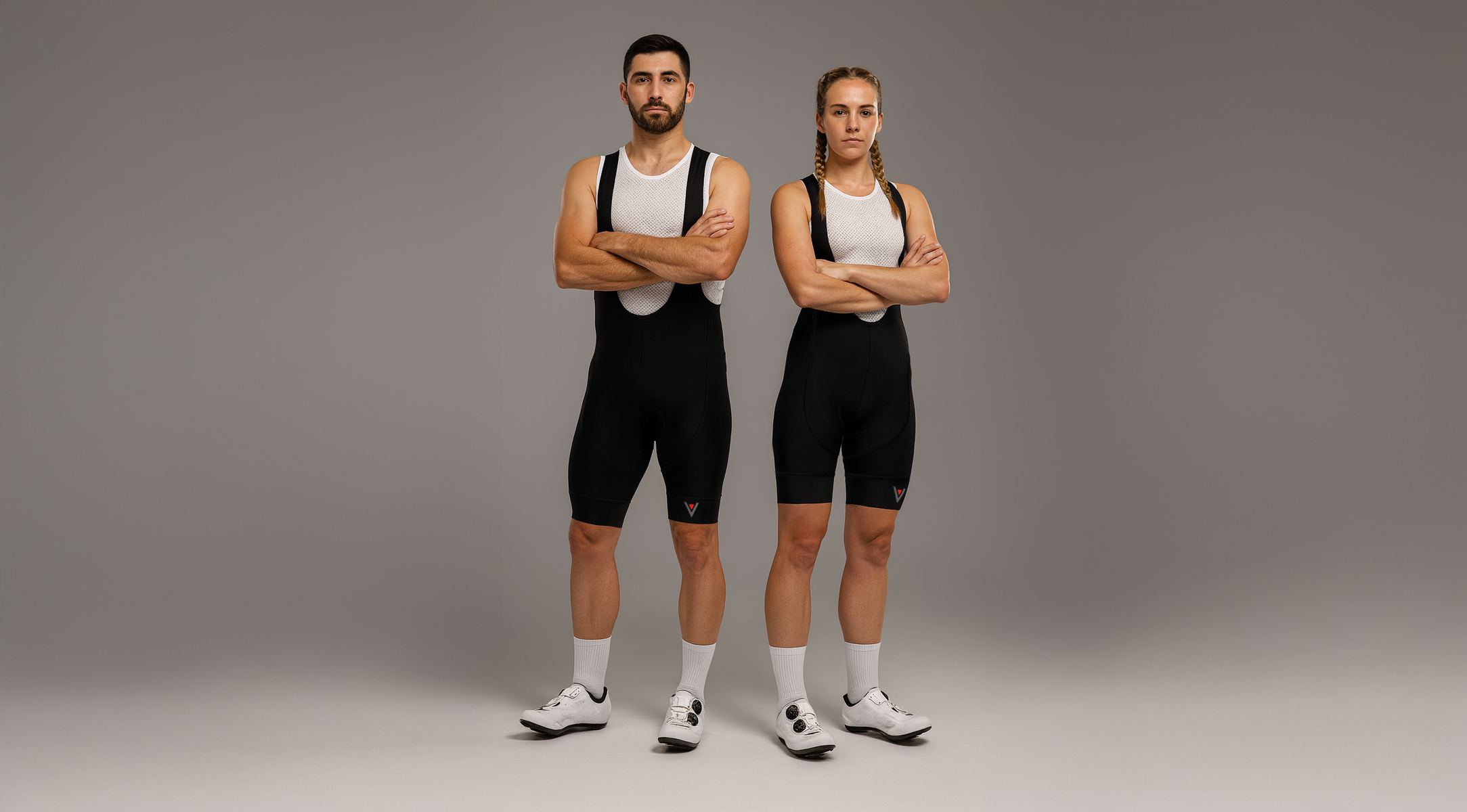 two cyclist wearing black bib shorts